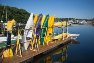 Kayaks lined up in wait for your next adventure. kennebunk-jd-kennebunkport-marine-rental