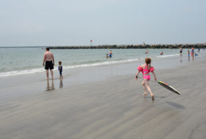 Kids frolic at Roger Wheeler Beach. point-judith-az-beach