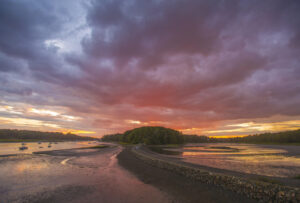 Low tide reveals the causeway leading to Steadman Woods. york-jd-beach-walkway