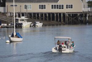 A boating family makes its way on a new adventure. york-jd-family-boating