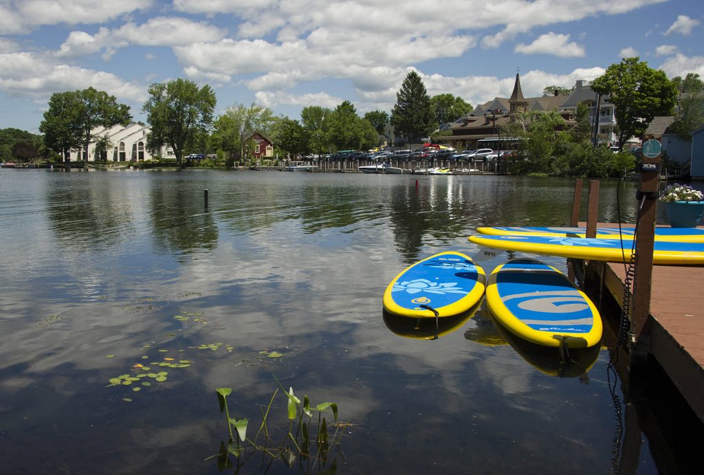 a group of paddle boards on a lake